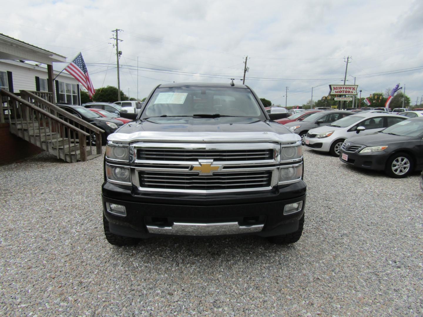 2015 Black Chevrolet Silverado 1500 High Country Crew Cab 4WD (3GCUKTEJ9FG) with an 6.2L V8 OHV 16V engine, Automatic transmission, located at 15016 S Hwy 231, Midland City, AL, 36350, (334) 983-3001, 31.306210, -85.495277 - Photo#1